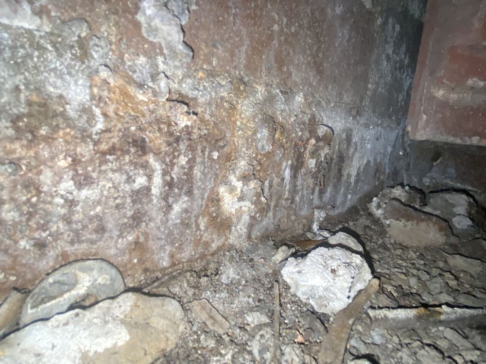 Water staining and calcite on the foundation walls from moisture ingress, Winston Hills, Rouse Hill