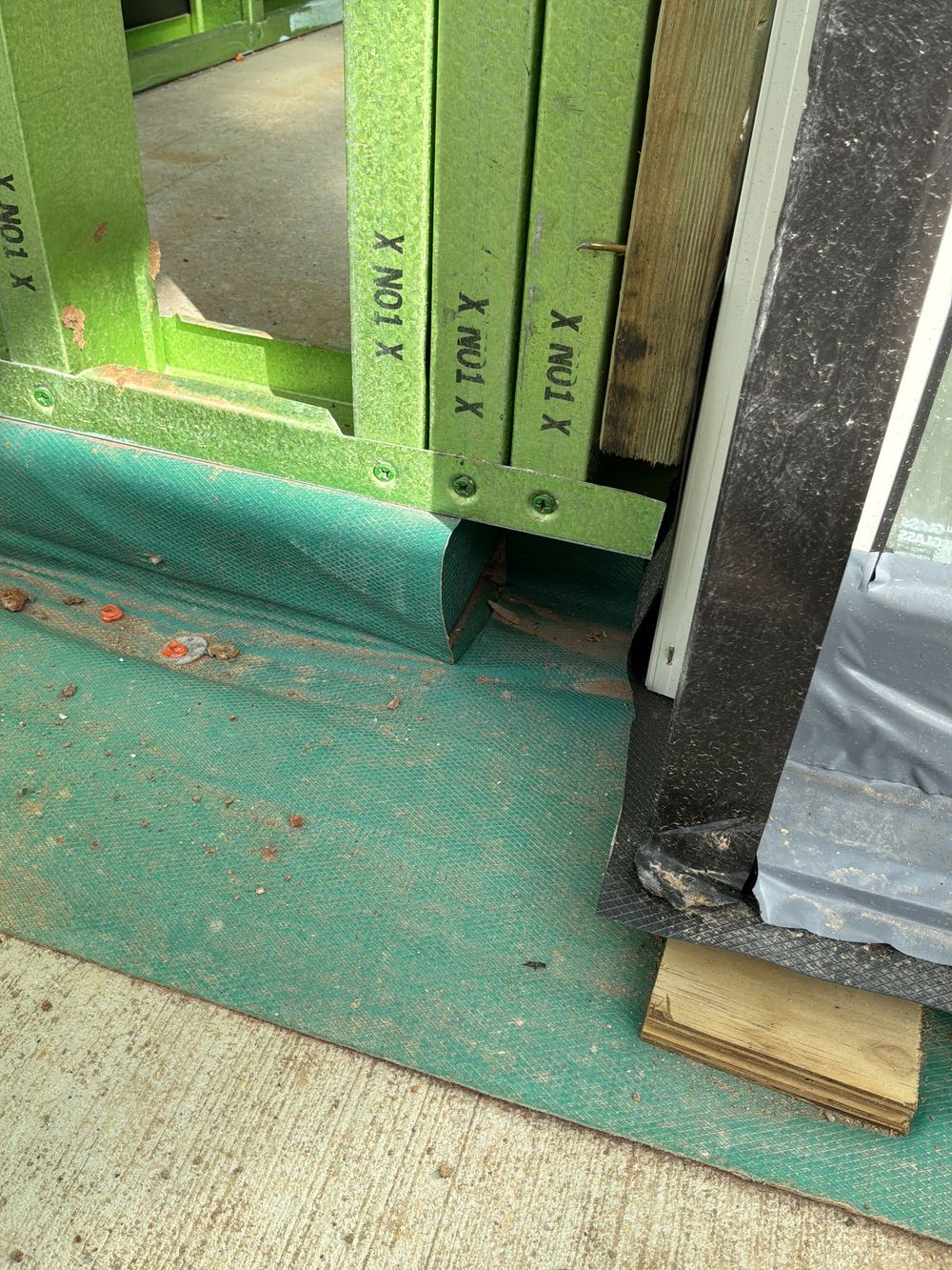 Bottom plate overhanging the slab by more than the 10mm allowed, found during a frame inspection in Rouse Hill