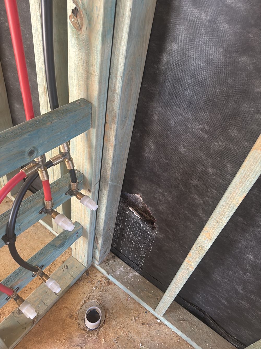 Torn sarking under the roof, reducing its protection against wind driven rain, found during a lock-up inspection in Rouse Hill