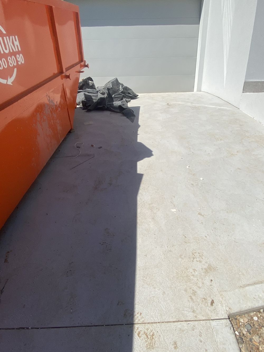 Driveway control joints never saw cut, so the concrete will crack at random, found during a handover inspection in Rouse Hill
