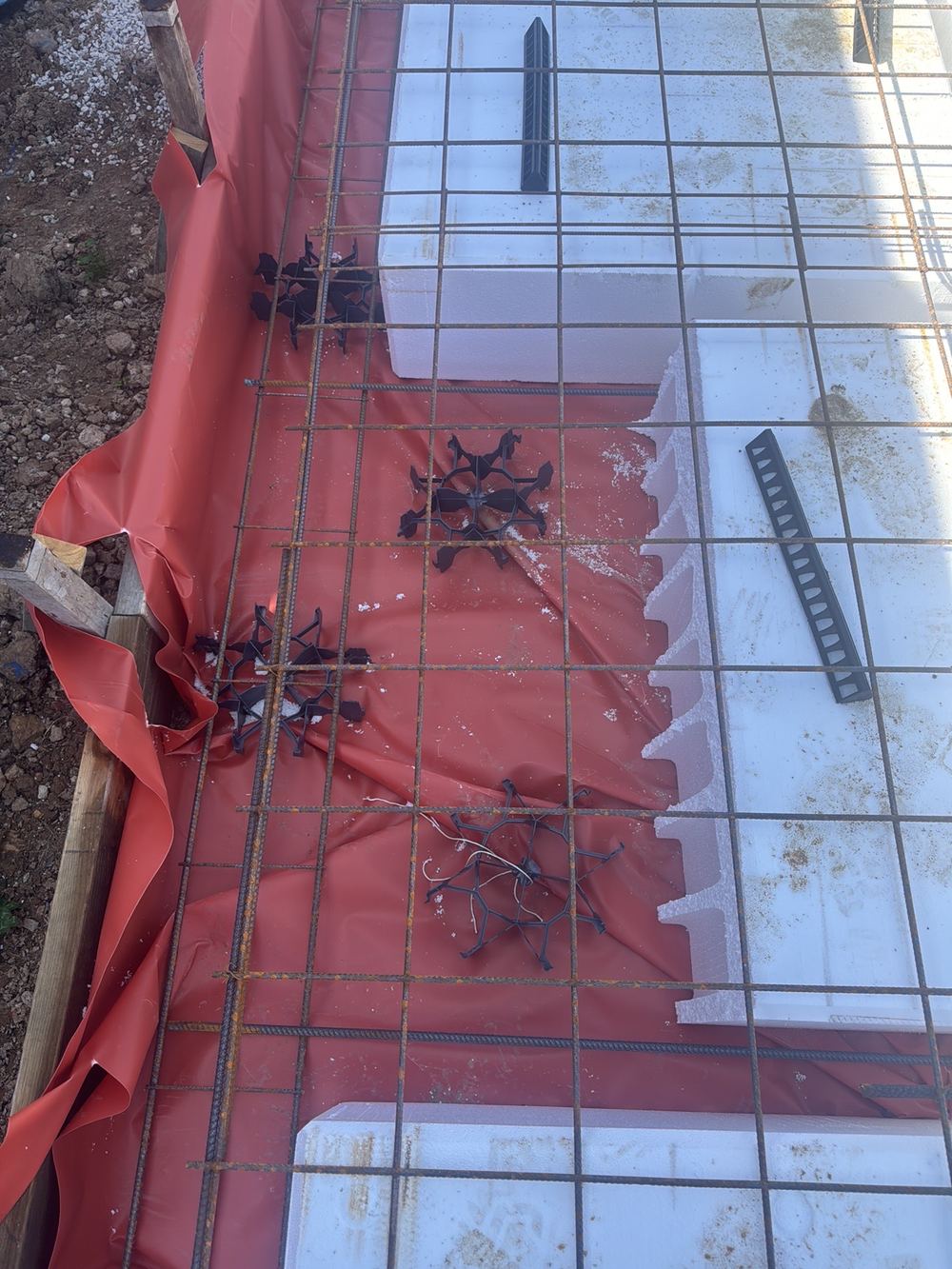 Slab thickening missing its top and bottom mesh shown on the structural drawings, Rouse Hill