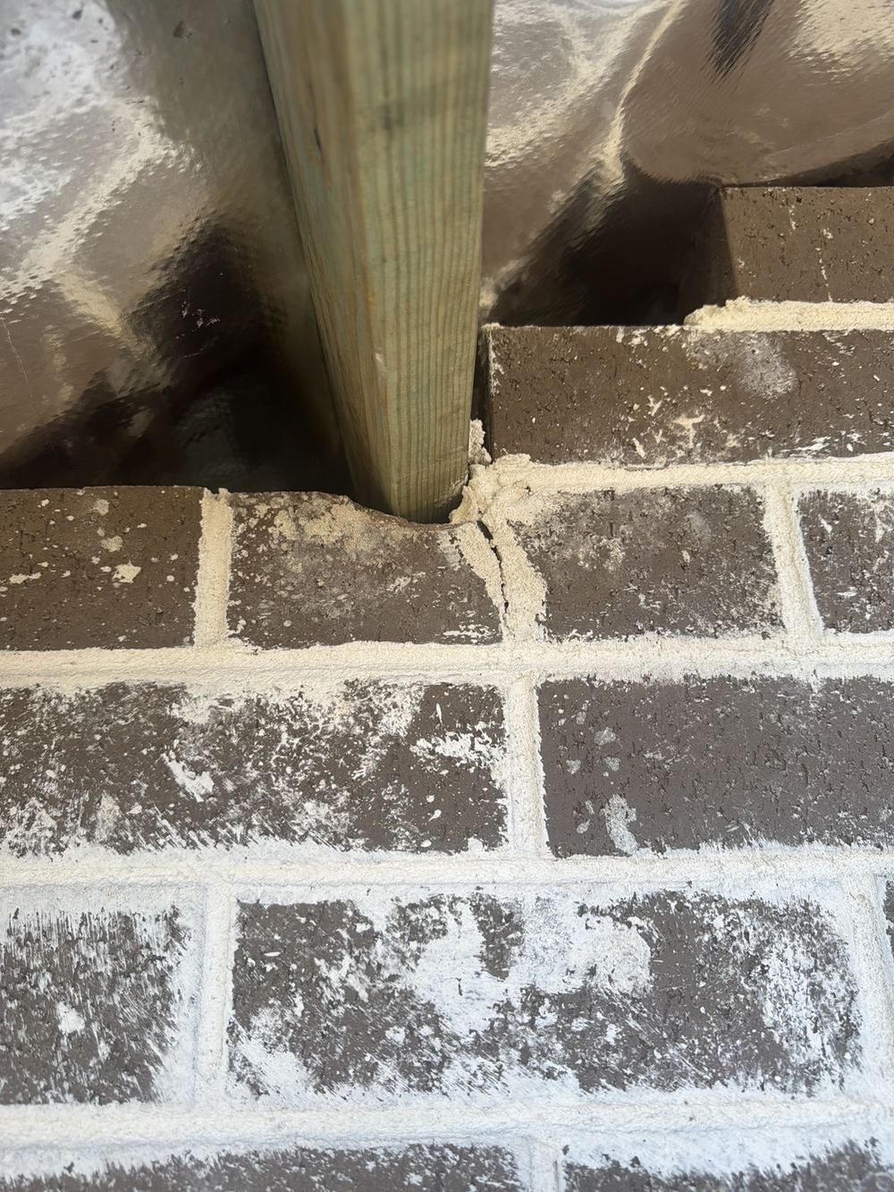 Roof timber touching the brickwork with no gap between them, Rouse Hill