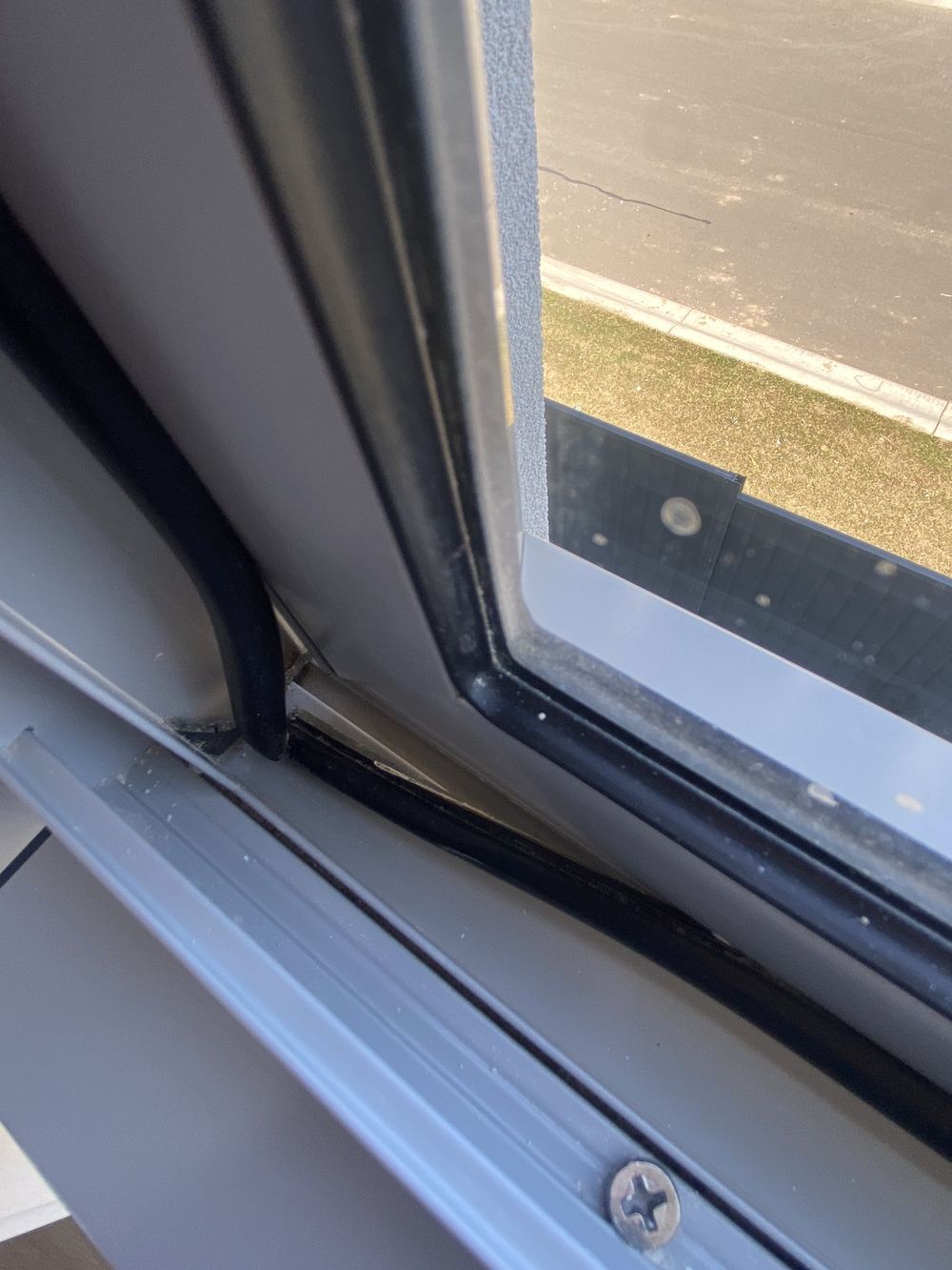 Front window binding in its frame and hard to open, Rouse Hill